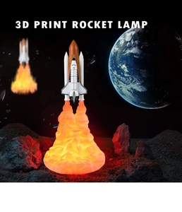 Detailed view of the 3D printed rocket lamp base showing realistic fire and smoke glow