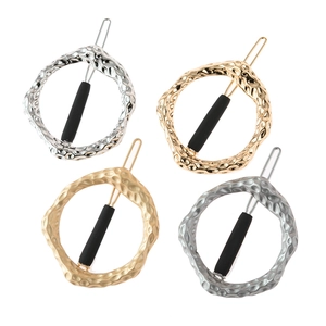 Irregular textured metal hair clip set with hammered gold and silver finishes