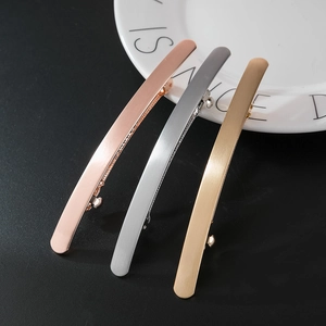 Minimalist metallic spring hair clips in gold rose gold and silver with brushed finish