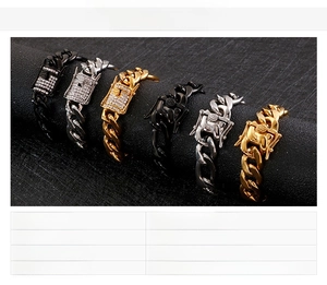 Detail of hip hop Cuban link bracelets in gold, silver, and black with rhinestone clasps