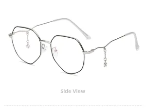 Detail view of silver polygonal glasses frame with hanging star rhinestone pendant chain