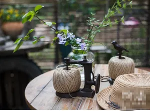 Retro cast iron twine holders in sewing machine and bird shapes for garden decor