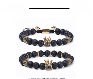 Detail view of 8mm black lava stone crown bracelets with adjustable braided cord and elastic