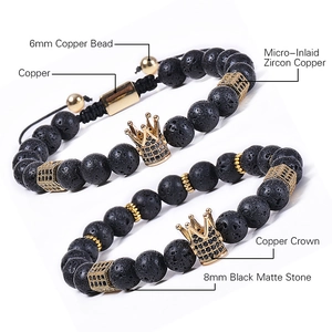 Lava stone and matte black bead bracelets featuring zircon-encrusted copper crown accents