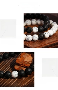 Macro detail showing porous black volcanic lava stone and white turquoise bead textures