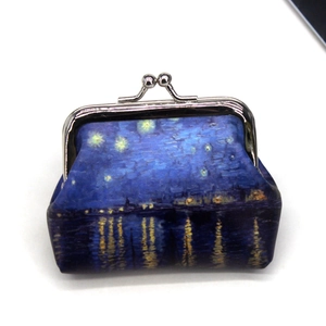 Close-up of vintage canvas coin purse with Starry Night oil painting print and silver clasp