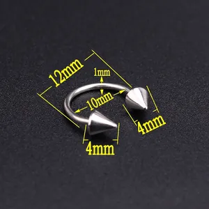 Macro detail of 10mm inner diameter stainless steel horseshoe ring with 4mm cone spikes