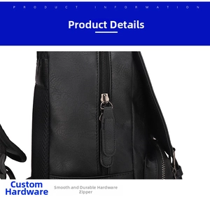 Détail du curseur de fermeture en métal et texture cuir sur un sac à dos noir