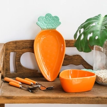 Creative carrot shaped ceramic dinnerware set including orange bowls and matching spoons