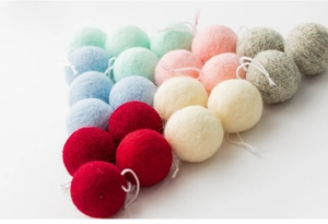 Colorful wool felt balls in diagonal rows for Christmas tree DIY craft decorations