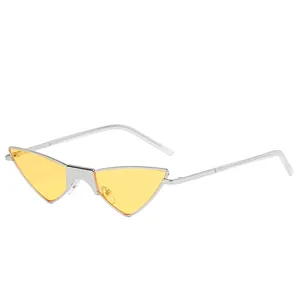Modern silver metal sunglasses with trendy yellow triangle lenses shown at 45-degree angle