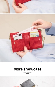 Detail view of vintage PU leather wallet showing red and black colors with clasp closure