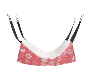 Detail showing red cat print fabric and soft white faux lamb wool lining on a pet hammock