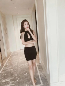 Detailed view of the black two-piece lingerie set featuring a sleeveless hollow-out top