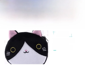 Close-up of plush cartoon cat coin purse with yellow eyes embroidery and metal zipper