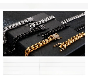 Close-up of hip hop cuban link necklace clasp with sparkling crystals in gold and silver