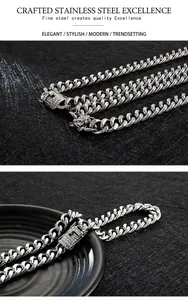 Detailed view of silver Cuban link necklace with rhinestone encrusted square clasp