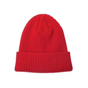 Classic red knitted beanie with vertical ribbed pattern and wide folded cuff for adults