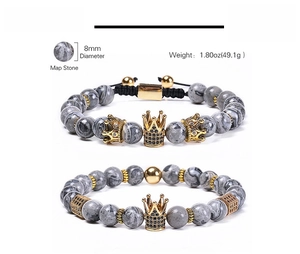 Detailed view of 8mm map stone bead bracelets with gold crown and cubic zirconia