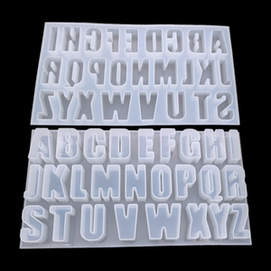 Macro shot of 26 uppercase alphabet silicone molds for DIY crystal epoxy resin casting