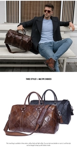 Detail of vintage genuine leather travel bag with quilted stitching and reinforced handles