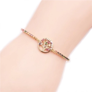 Gold tree of life bracelet with colorful zircon stones on woman wrist
