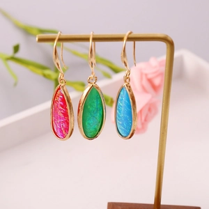 Bohemian teardrop earrings with colorful resin stones in gold-plated hooks