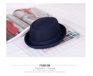 Detail of dark blue breathable mesh weave fedora hat with a stylish matching ribbon