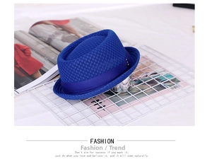 Detail of blue breathable mesh fedora hat with satin ribbon and metal buckle on white rack
