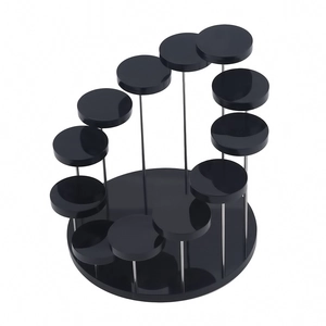 Detailed view of the 12-tier spiral acrylic jewelry stand with black circular display trays