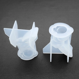 Macro shot of 3D rabbit and geometric translucent silicone molds for DIY resin crafts