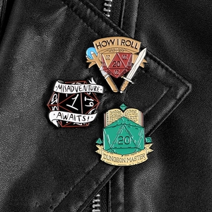 Close-up of d20 tabletop game enamel pins with creative slogans on black leather jacket
