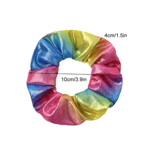 Detail showing the 10cm outer diameter and 4cm width of this rainbow fabric hair scrunchie