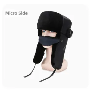 Side view of black winter ushanka hat with plush faux fur lining and matching face mask