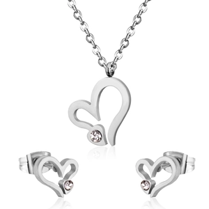Polished silver heart jewelry set with necklace and earrings featuring white rhinestones