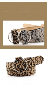 Detail view of stylish leopard and snake print belts with double silver ring buckles