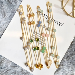 Long sweater necklace with colorful gem-cut crystal square pendants and gold chains