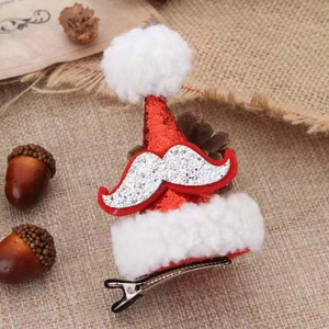 Red glitter mini Santa hat hair clip with silver beard on rustic linen background