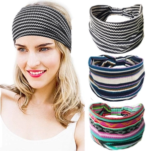 Detail view of elastic sports headbands featuring bohemian prints and striped patterns