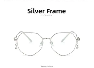 Polygonal silver metal glasses frame featuring unique star pendant detail on the side