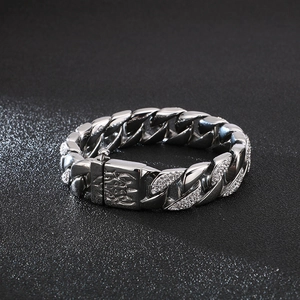 Men's silver Cuban link bracelet with sparkling rhinestones and engraved box clasp