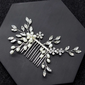 Silver bridal hair comb with handmade white pearls and sparkling crystal flowers