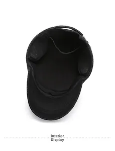 Close-up of winter hat interior featuring thick black fleece lining and warm ear flaps