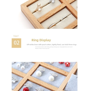 Detail view of beechwood jewelry tray with three slots for rings and earrings