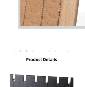 Close-up of gold and silver necklace chains displayed on solid wood jewelry boards