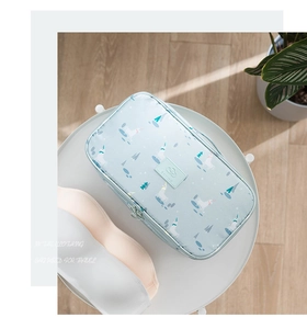 Detail of travel underwear storage bag with unicorn print and sturdy carrying handle