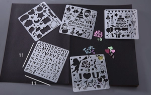Five white plastic stencil templates for DIY scrapbooking with Christmas and birthday motifs