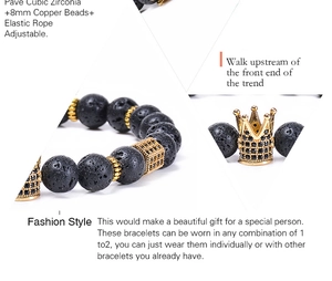 Macro detail of lava stone beads and gold-plated crown with cubic zirconia inlay