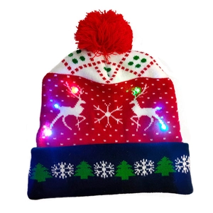 LED Christmas knitted hat with reindeer patterns and colorful glowing festive lights