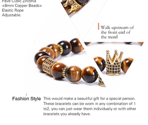 Detail of 8mm tiger eye beads and crown charm with micro-pave cubic zirconia